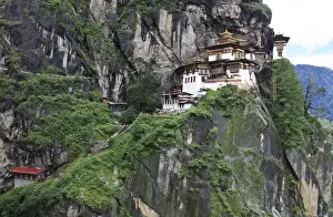 Tigers Nest Prints: Asia, Bhutan. Taksang Dzong monastery is built into the rock and hangs on a precipitous
