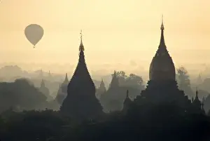 Asia, Burma, (Myanmar), Pagan (Bagan) Hot Air balloon over the temple complex of Pagan at dawn