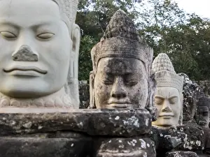 Deity Prints: Asia; Cambodia; Angkor Watt; Siem Reap; Deamon heads on the gods and deamon bridge