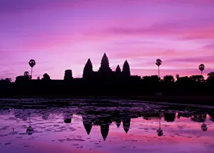 Asia, Cambodia, Siem Reap, Angkor Wat (b. 12th century). View of temple at dawn