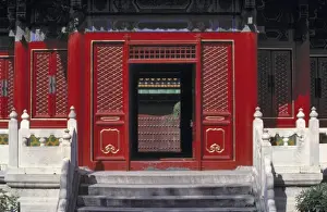 Lacquer Prints: Asia, China, Beijing. White balastrades contrast with this striking red lacquer door