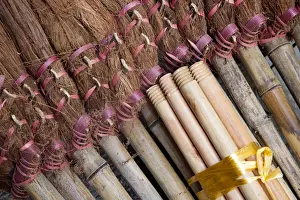 Chinese Prints: Asia, China, Hong Kong. A display of handmade straw dust brooms for sale