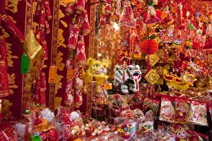 Chinese Prints: Asia, China, Hong Kong. A variety of colorful Chinese ornaments for sale in a shop
