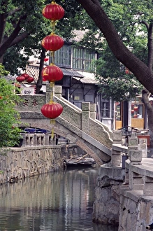 Water Town Prints: Asia, China, Jiangsu Province, Luzhi. Scene of ancient buildings, canal and arched