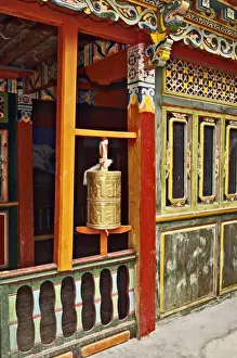 Yunnan Prints: Asia, China, Yunnan, Deqin. Prayer wheel in Tibetan family house at Shangqiatou Village