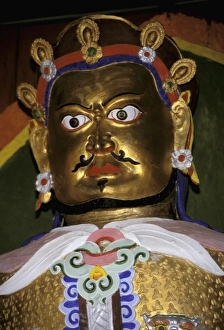 Asia, China, Yunnan Province, Lijiang. Yufeng Monastery, colorful statue of Chinese