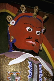 Asia, China, Yunnan Province, Lijiang, Yufeng Monastery. Colorful statue of Chinese