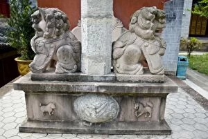 Asia, China, Yunnan Province, Mojiang. Sculpture on gate support at Confucious temple