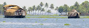 Images Dated 1st April 2007: Asia, India, Kerala (Backwaters). Houseboats float along a Kerala Backwaters canal