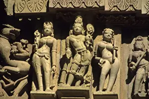 Asia, India, Khajuraho. Erotic carved figures remind visitors to leave sexual or