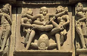 Asia, India, Khajuraho. Erotic carved figures remind visitors to leave sexual or