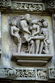 Asia, India, Khajuraho. Erotic carved figures remind visitors to leave sexual or