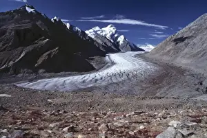 Asia, India, Ladakh, Pensila. Pensila Glacier cuts a cold, white swath through the Zanskar Valley