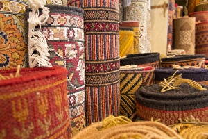 Images Dated 23rd January 2014: Asia, India, Rajasthan, Jaipur, the making of carpets. Rolled carpets for sale