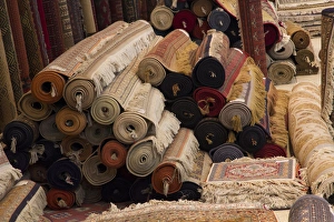 Carpet Prints: Asia, India, Rajasthan, Jaipur, the making of carpets. Rolled carpets for sale