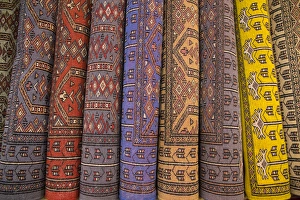 Images Dated 23rd January 2014: Asia, India, Rajasthan, Jaipur, the making of carpets. Rolled carpets for sale