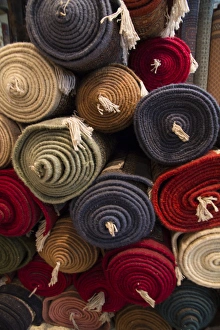 Carpet Prints: Asia, India, Rajasthan, the making of carpets. Rolled carpets for sale