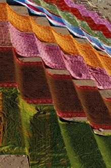 Images Dated 30th August 2007: Asia, India, Varanasi Region. Allahabad, drying saris on the bank of the Ganges River