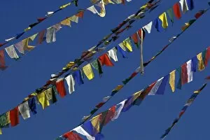 Asia, Nepal, Khatmandu. Bouddhanath Stupa, flags