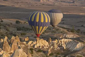 Images Dated 14th September 2014: Asia, Turkey, Cappadocia. Hot Air Ballooning in Turkey, Goreme Valley, near Urgup