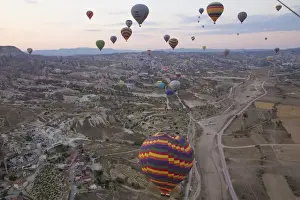 Images Dated 14th September 2014: Asia, Turkey, Cappadocia. Hot Air Ballooning in Turkey, Goreme Valley, near Urgup