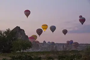 Images Dated 14th September 2014: Asia, Turkey, Cappadocia. Hot Air Ballooning in Turkey, Goreme Valley, near Urgup