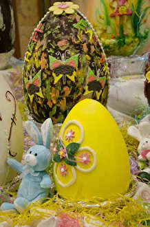 Australia. Easter display of holiday chocolate eggs and blue stuffed Easter Bunny