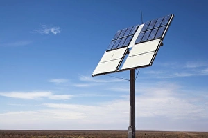 Electrical Prints: Australia, South Australia, Coober Pedy, Solar panel in outback desert along empty