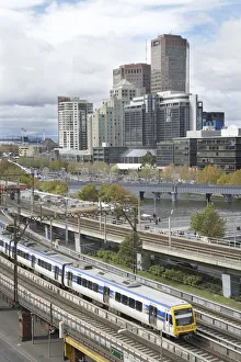 Images Dated 25th April 2009: Australia, Victoria, Melbourne, Passenger Train, Yarra River and Office Blocks