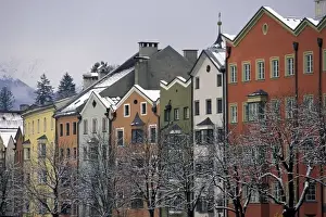 Austria, Tirol, Innsbruck. Colorful buildings along Inn River
