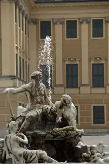 Austria, Vienna. Maria Theresas baroque Schonbrunn Palace, fountain. UNESCO