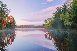 Images Dated 12th October 2016: Autumn Colors and mist reflecting on Council Lake at sunrise, Hiawatha National Forest