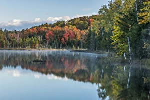 Images Dated 12th October 2016: Autumn Colors and mist reflecting on Council Lake at sunrise, Hiawatha National Forest