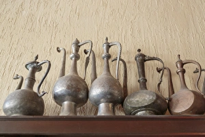 Images Dated 27th September 2014: Azerbaijan, Lahic. A collection of engraved kettles
