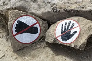 Warning Prints: Azerbaijan, Qobustan. A warning to not touch or walk on the rocks at Gobustan National