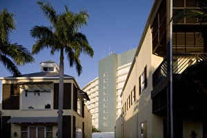 Images Dated 6th April 2007: Bahamas, Grand Bahama Island, Freeport, Setting sun lights exterior and palm trees