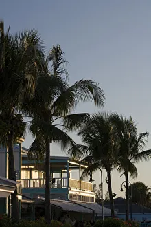 Images Dated 6th April 2007: Bahamas, Grand Bahama Island, Freeport, Setting sun lights waterfront restaurants
