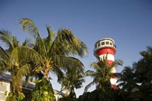 Images Dated 7th April 2007: Bahamas, Grand Bahama Island, Freeport, Setting sun lights lighthouse exterior