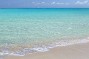 Bahamas, Little Exuma Island. Ocean surf and beach