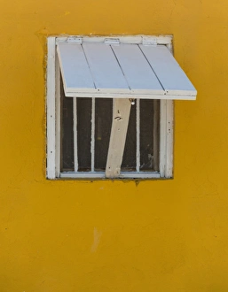 Little Exuma Island Prints: Bahamas, Little Exuma Island. Window in yellow wall