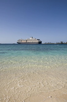 Bahamas, New Providence Island, Cruise ship sails past Cable Beach