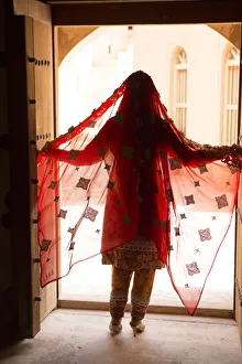 Woman Prints: Bahla Fort. Unesco World Heritage. Oman. Model Release