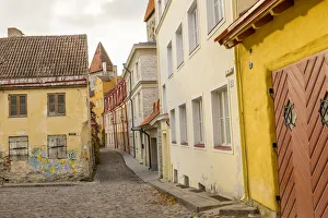 Architecture Collection: Baltic States, Estonia, Tallinn. Cobblestone street in the old city