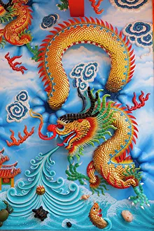 Aqua Prints: Bangkok, Thailand. Colorful relief depicting dragon or sea serpent