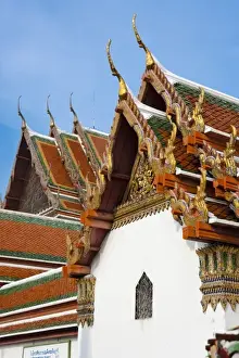 Inti St Clair Prints: Bangkok, Thailand - Temple facade with ornate roofing at Wat Phra Kaeo