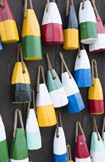 Images Dated 2029: Bar Harbor Maine colorful buoys on wall for sale and state specialty souvenirs for