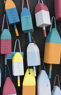 Images Dated 2029: Bar Harbor Maine colorful buoys on wall for sale and state specialty souvenirs for