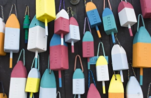 Images Dated 2029: Bar Harbor Maine colorful buoys on wall for sale and state specialty souvenirs for