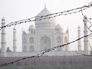 Mausoleum Prints: Barbed wire fence in front of Taj Mahal, Agra, Uttar Pradesh, India