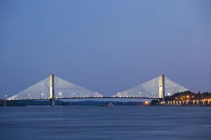Images Dated 28th June 2017: Barge on Mississippi River and Bill Emerson Memorial Bridge at dusk, Cape Girardeau